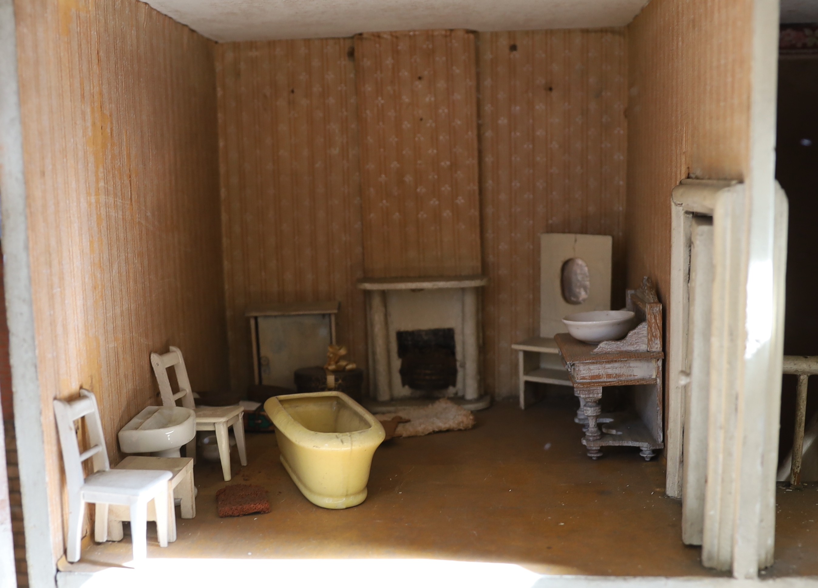 ‘Kits Coty House': An important G. & J. Lines furnished dolls’ house, dated 1912